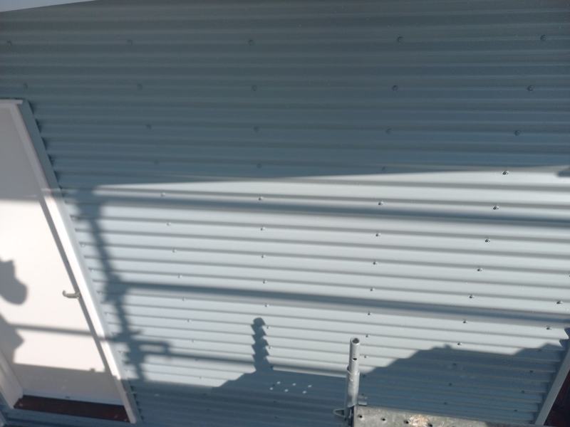 Long run of new wall cladding