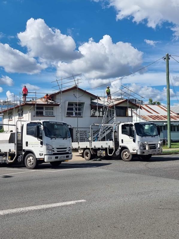 Jaymac trucks on site for a reroof